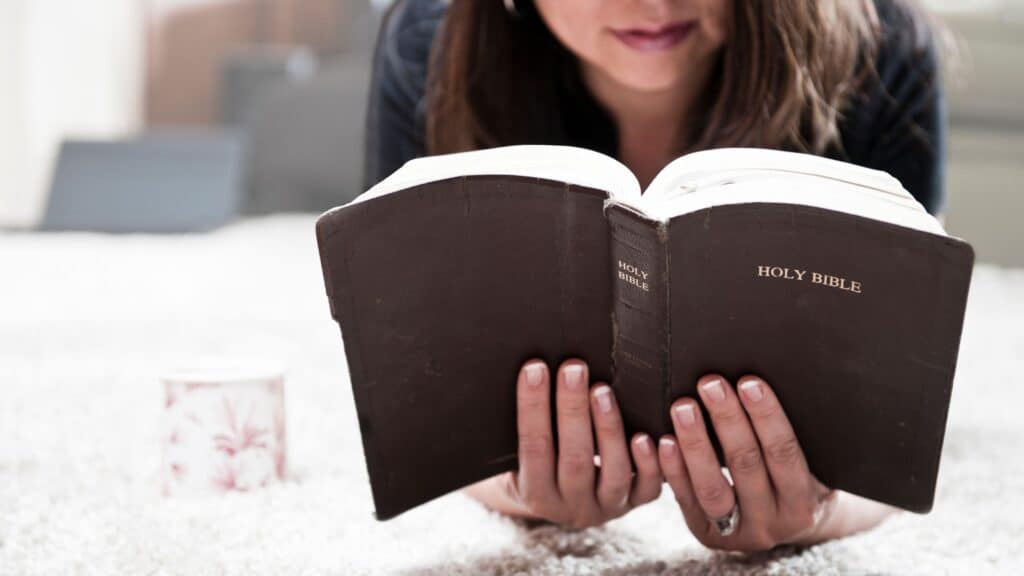 woman reading a bible